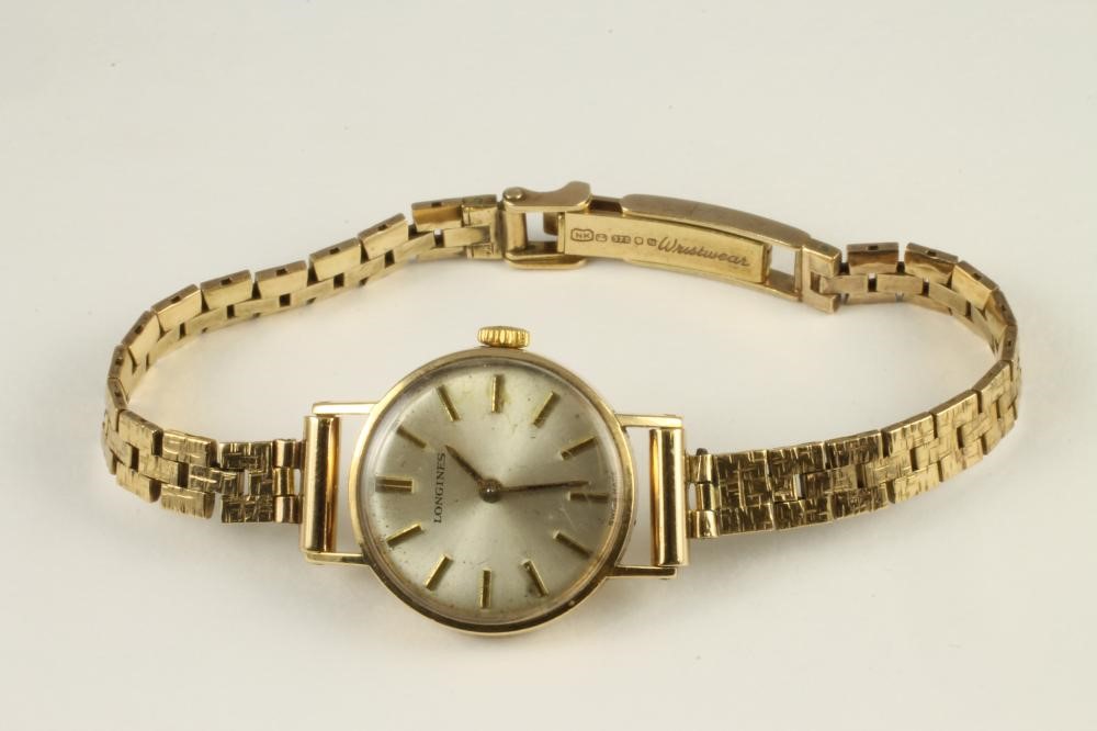 A LADY'S 9CT GOLD LONGINES WRISTWATCH Image