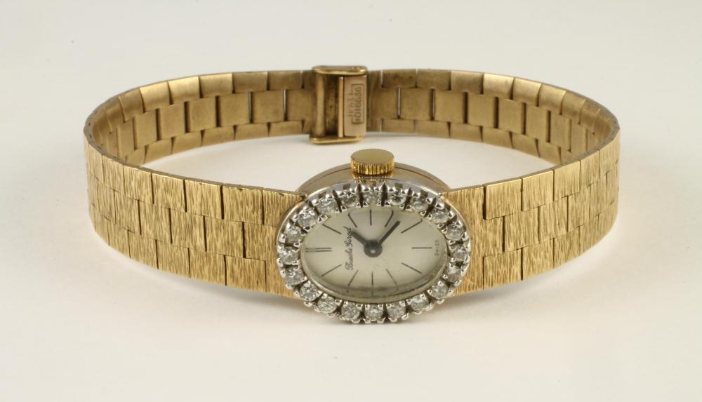 A LADY'S 9CT GOLD BUECHE GIROD WRISTWATCH Image