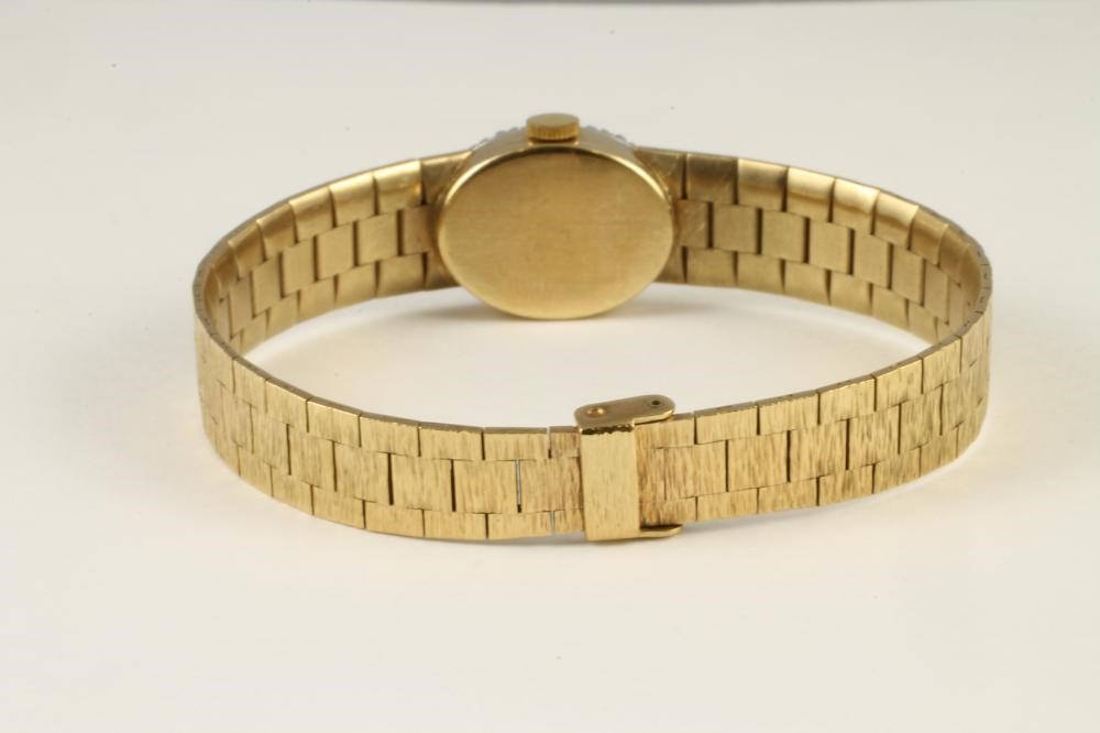 A LADY'S 9CT GOLD BUECHE GIROD WRISTWATCH Image