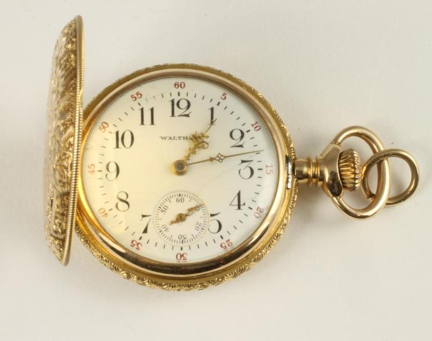 A LADY'S CONTINENTAL 14K GOLD WALTHAM TOP WIND FOB WATCH Image