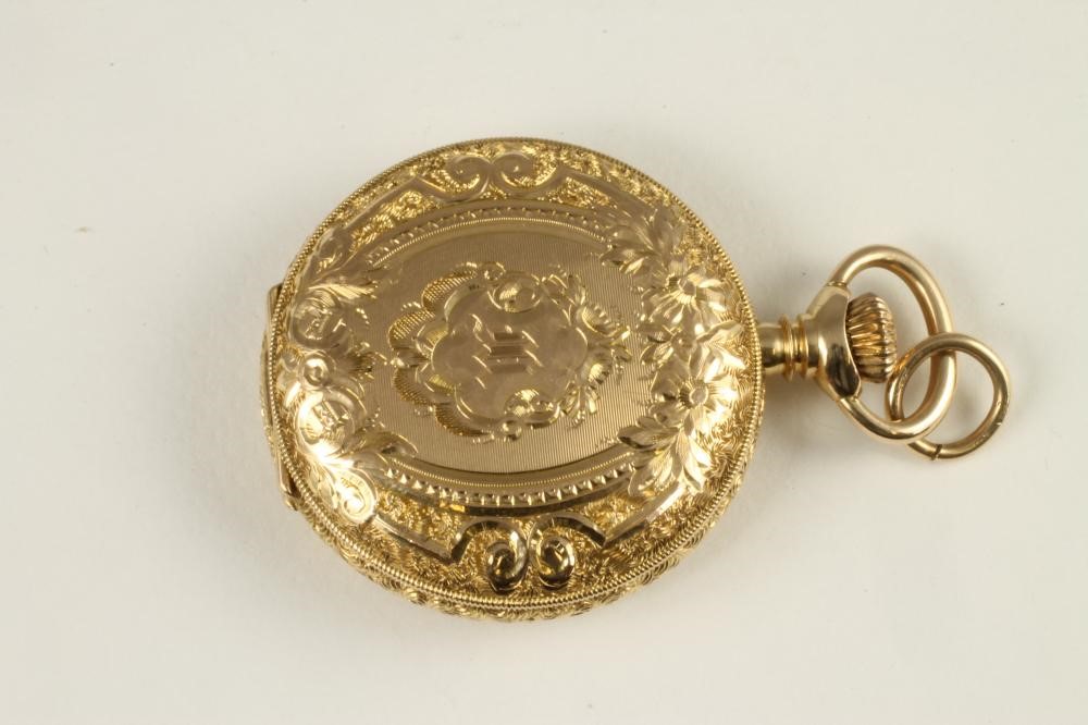 A LADY'S CONTINENTAL 14K GOLD WALTHAM TOP WIND FOB WATCH Image