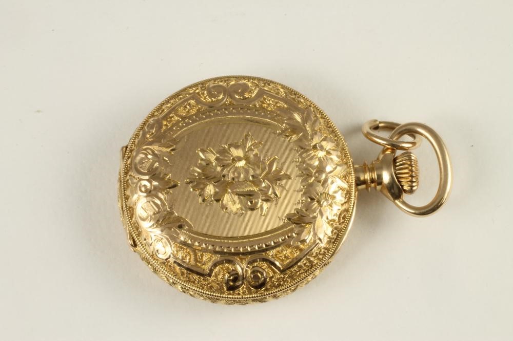 A LADY'S CONTINENTAL 14K GOLD WALTHAM TOP WIND FOB WATCH Image