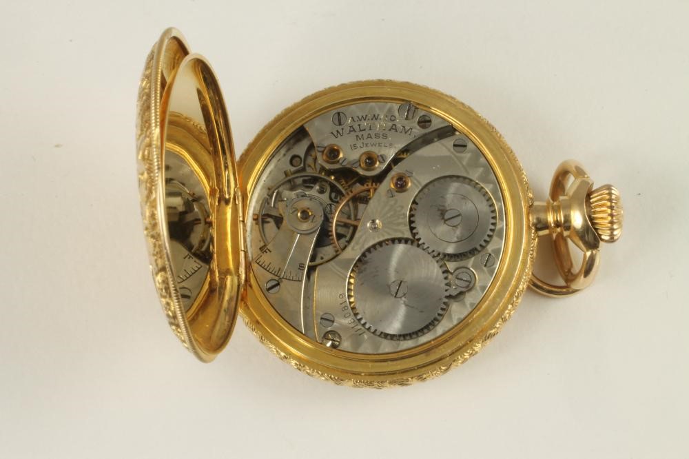 A LADY'S CONTINENTAL 14K GOLD WALTHAM TOP WIND FOB WATCH Image