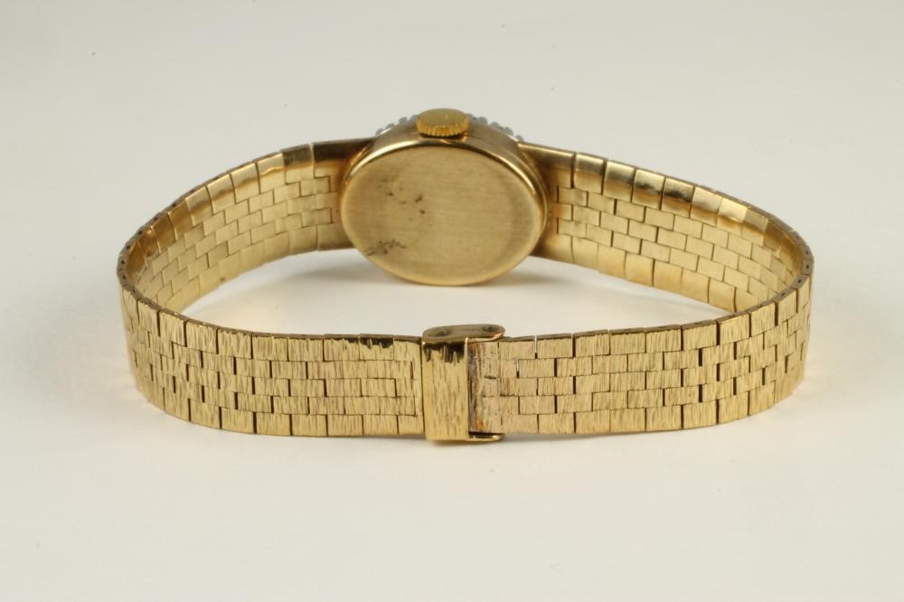 A LADY'S 9CT GOLD AND DIAMOND BUECHE GIROD WRISTWATCH Image