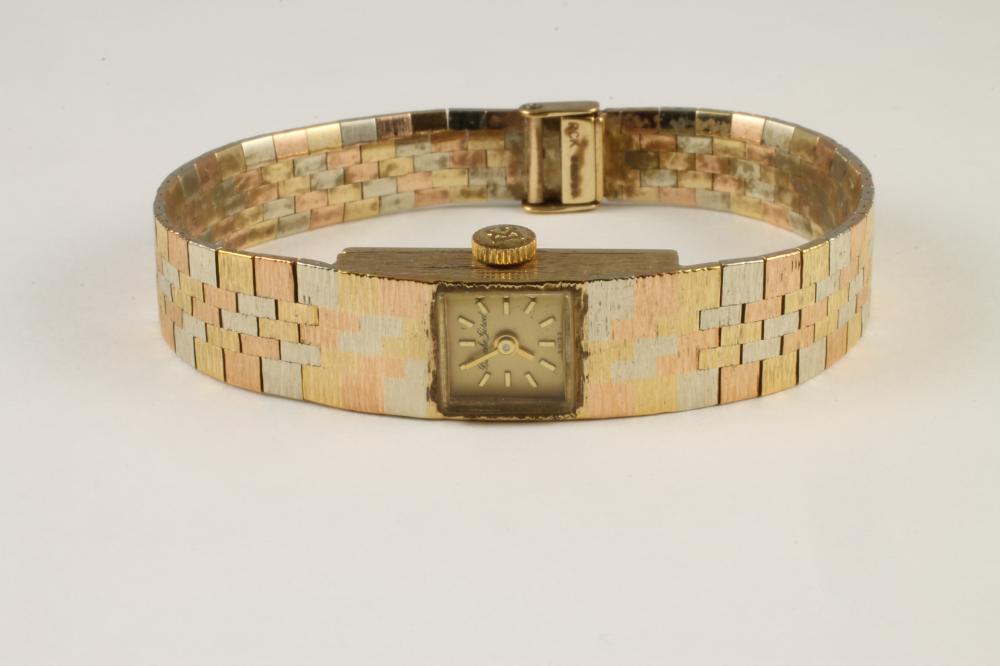 A LADY'S TRI COLOUR 9CT GOLD BUECHE GIROD WRISTWATCH Image