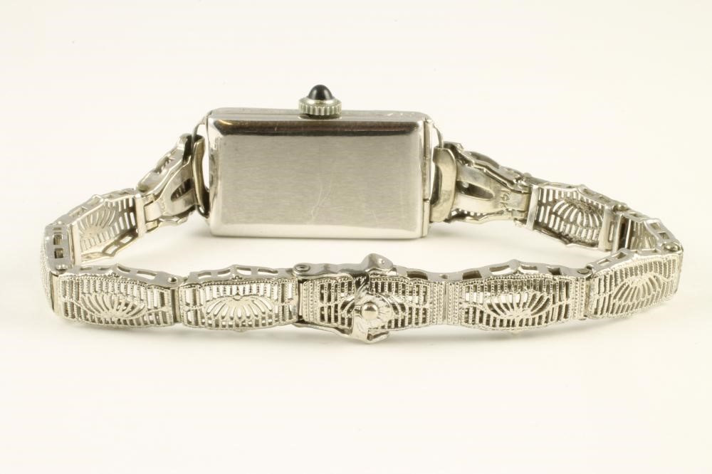 A LADY'S 18CT WHITE GOLD COCKTAIL WATCH Image