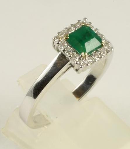 AN EMERALD AND DIAMOND RING Image