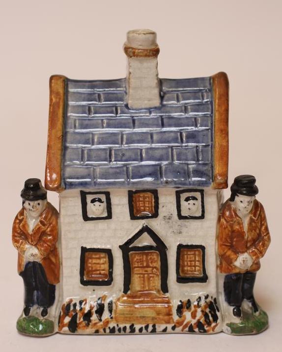 A PRATT TYPE EARTHENWARE MONEY BOX Image