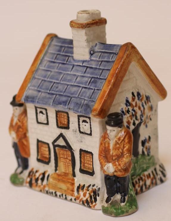 A PRATT TYPE EARTHENWARE MONEY BOX Image
