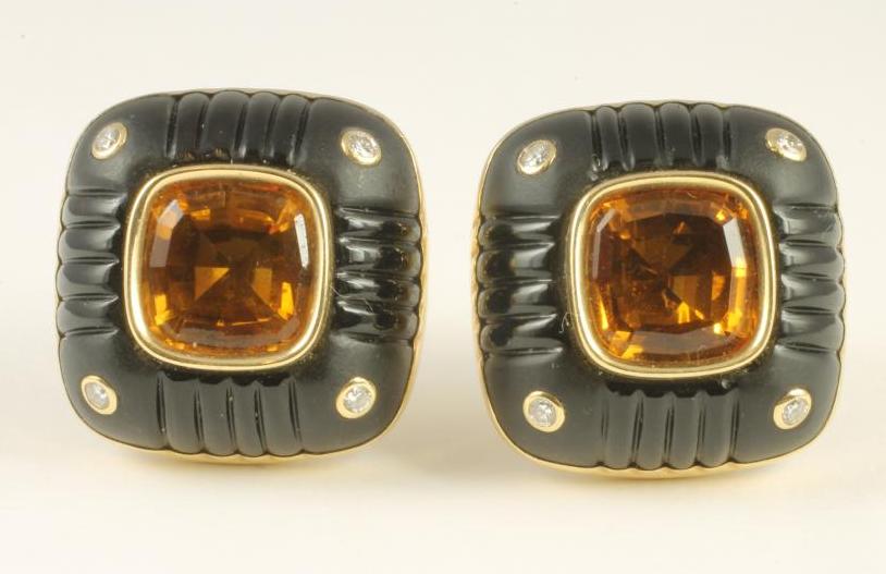 A PAIR OF TRIANON CLIP EARRINGS of rounded square form centred by a close back set citrine within a Image