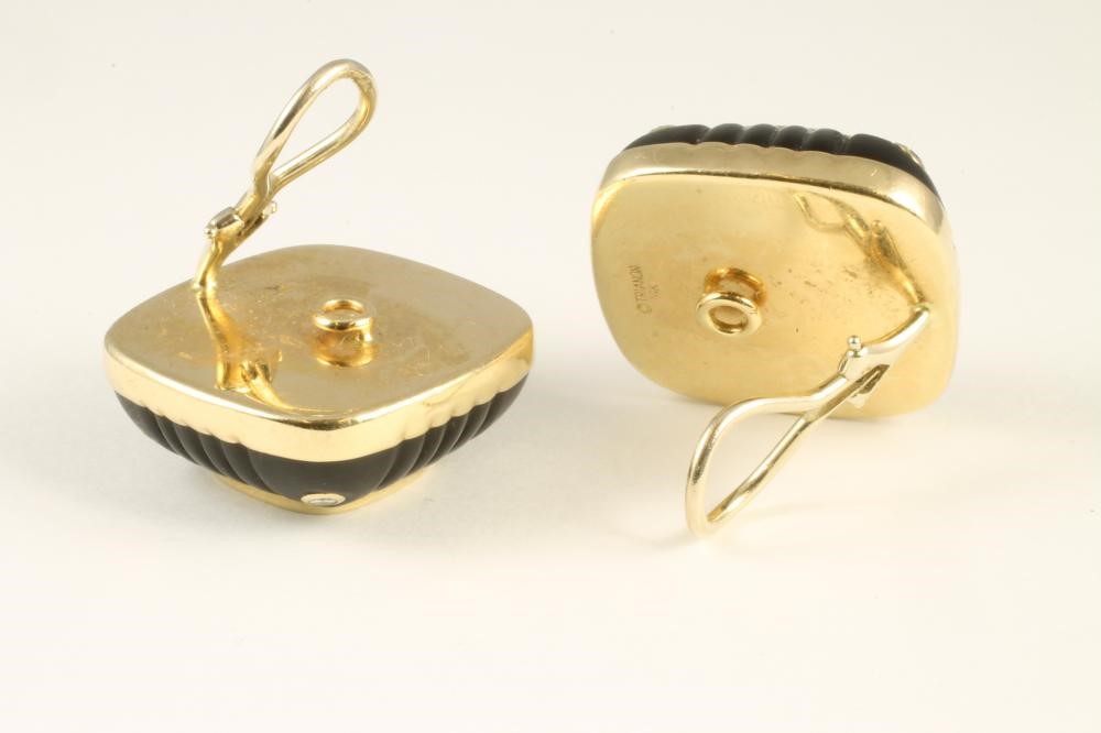 A PAIR OF TRIANON CLIP EARRINGS of rounded square form centred by a close back set citrine within a Image