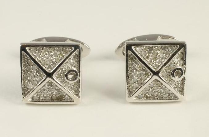 A PAIR OF DIAMOND CUFFLINKS Image