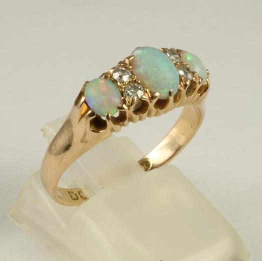 A VICTORIAN OPAL AND DIAMOND RING Image