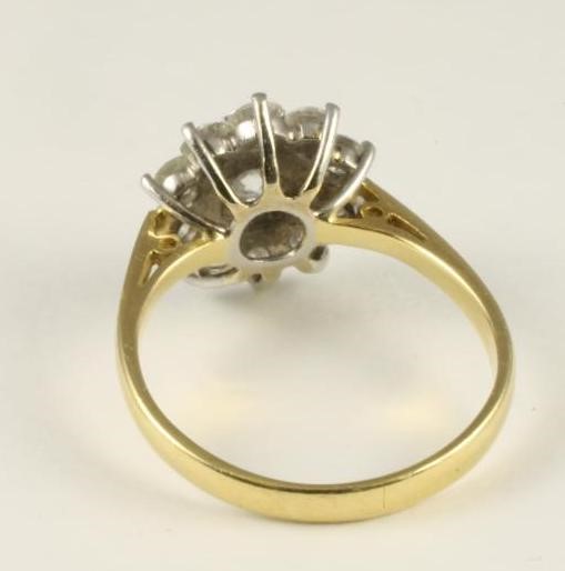 A DIAMOND CLUSTER RING Image