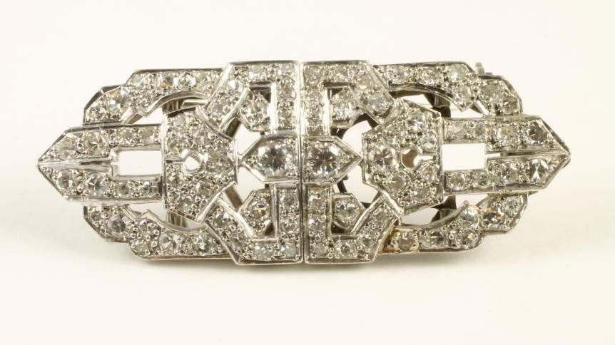 AN ART DECO DIAMOND CLIP BROOCH of shaped oblong form Image