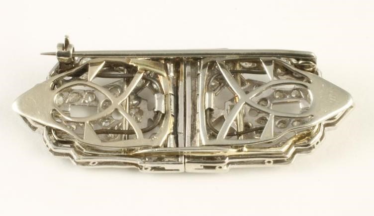 AN ART DECO DIAMOND CLIP BROOCH of shaped oblong form Image