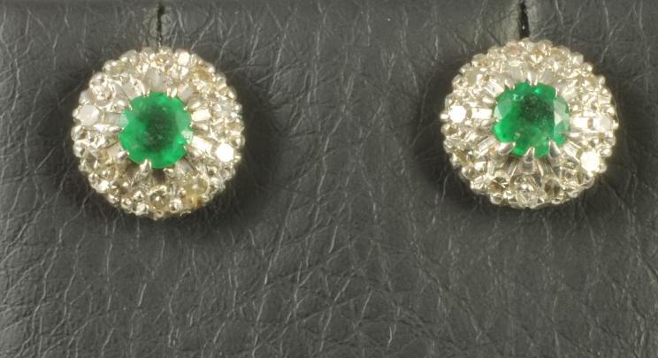 A PAIR OF EMERALD AND DIAMOND CLUSTER EAR STUDS Image