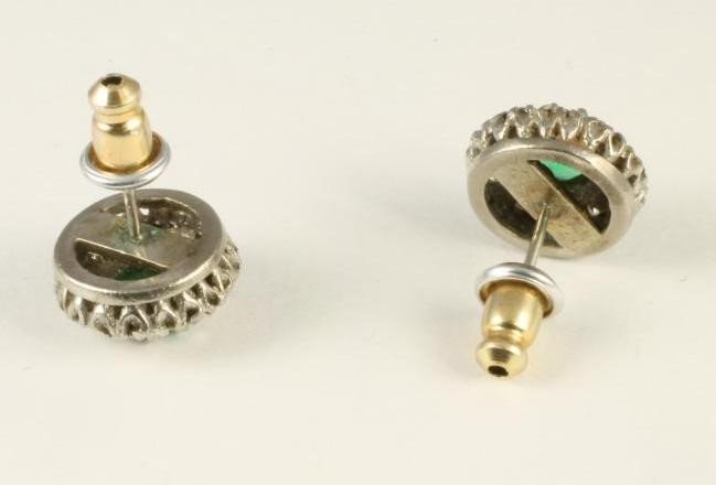 A PAIR OF EMERALD AND DIAMOND CLUSTER EAR STUDS Image