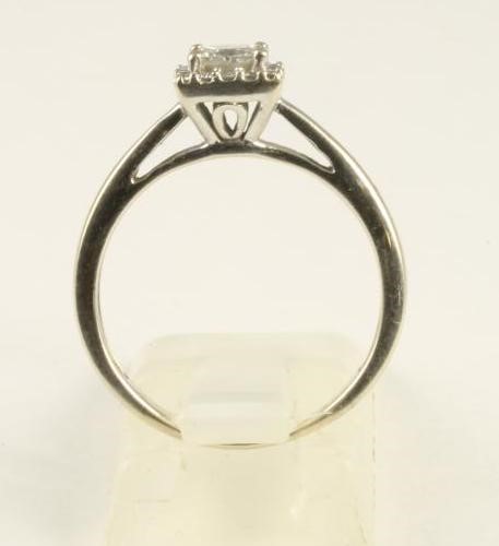 A DIAMOND CLUSTER RING Image