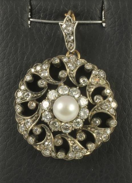 A VICTORIAN DIAMOND AND PEARL FLOWERHEAD PENDANT Image