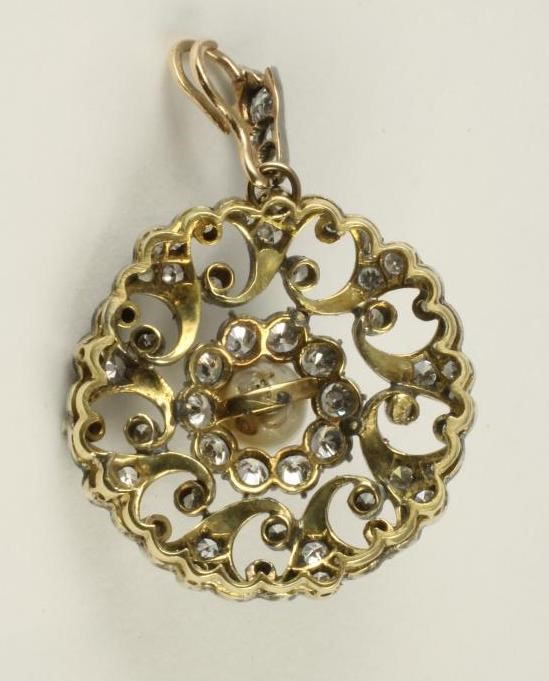 A VICTORIAN DIAMOND AND PEARL FLOWERHEAD PENDANT Image
