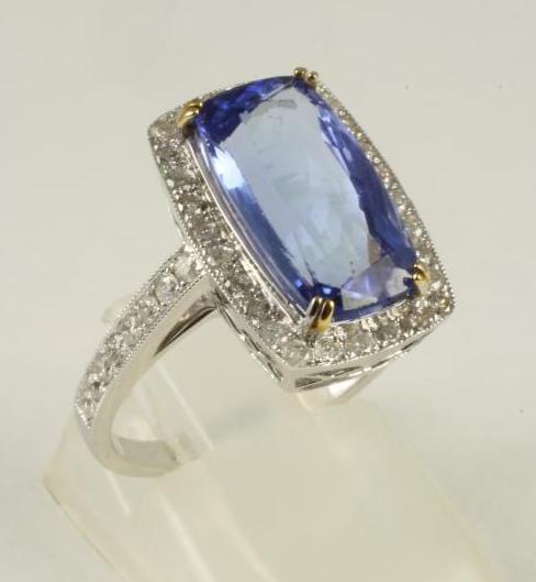 A TANZANITE AND DIAMOND DRESS RING Image