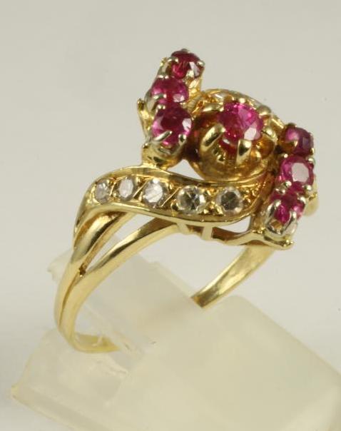 A MODERN RUBY AND DIAMOND COCKTAIL RING Image