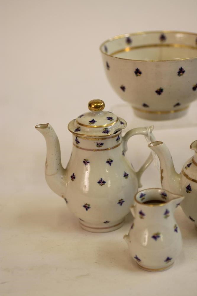 A MINIATURE CAUGHLEY PORCELAIN PART TEA AND COFFEE SERVICE Image