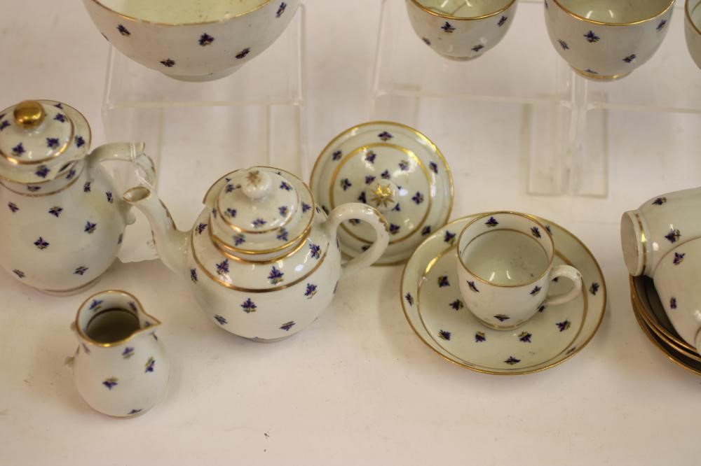 A MINIATURE CAUGHLEY PORCELAIN PART TEA AND COFFEE SERVICE Image