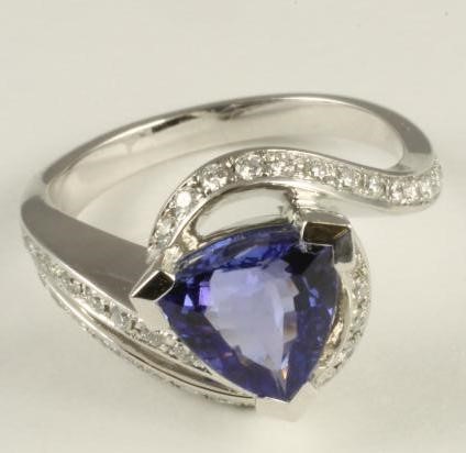 A TANZANITE AND DIAMOND DRESS RING Image