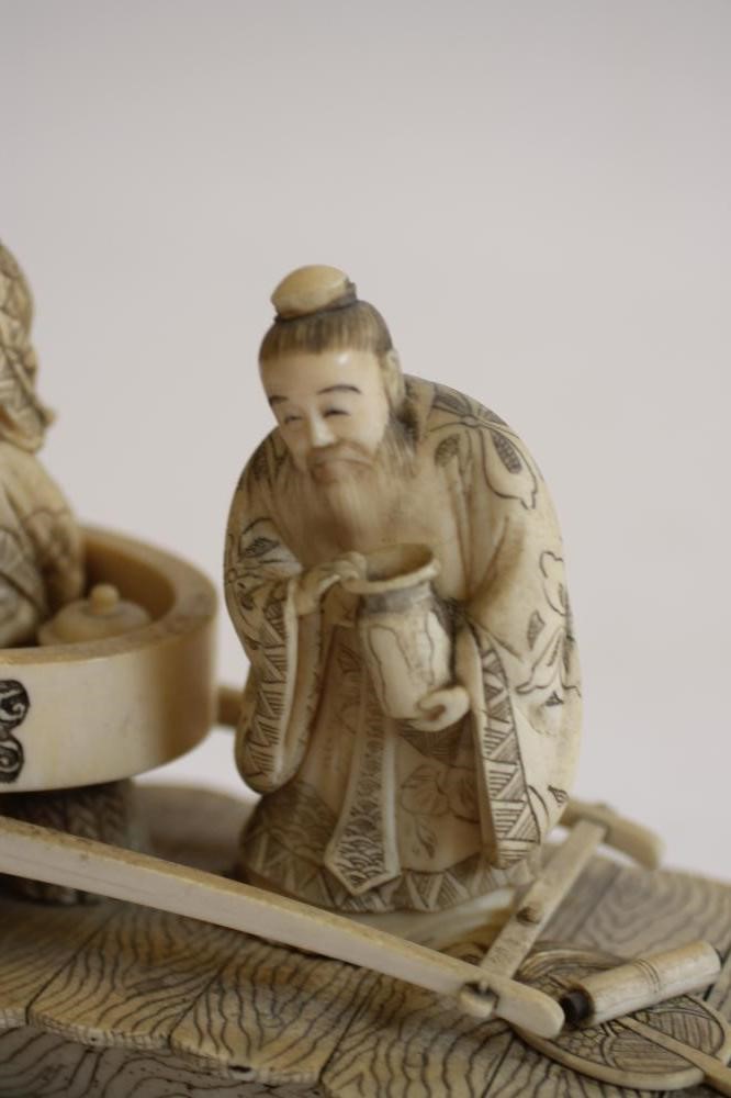 A JAPANESE MARINE IVORY FIGURE GROUP Image