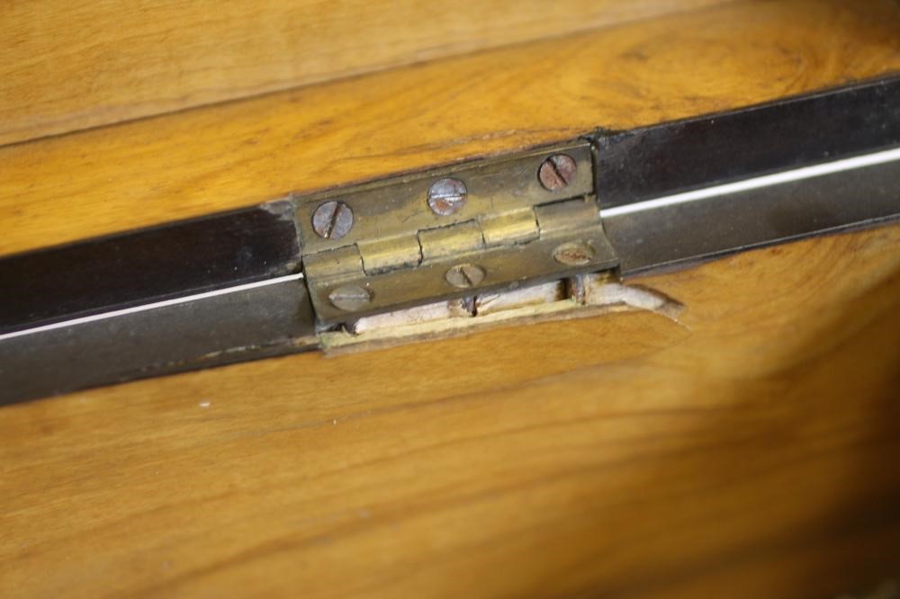 A VICTORIAN WALNUT AND EBONISED TABLE BOX of oblong form Image