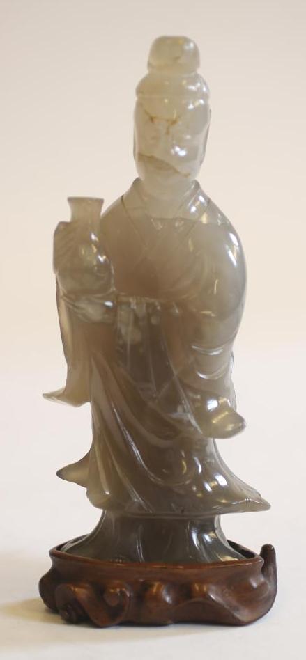 A CHINESE GREY QUARTZ FIGURE Image