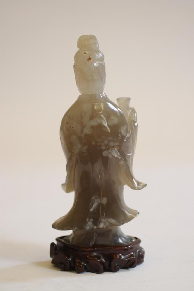 A CHINESE GREY QUARTZ FIGURE Image