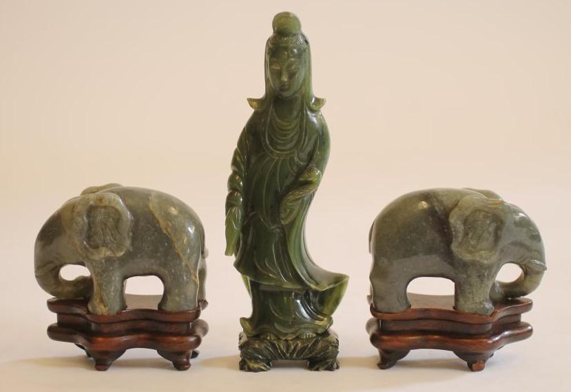 A PAIR OF CHINESE JADE TYPE MODELS OF ELEPHANTS Image