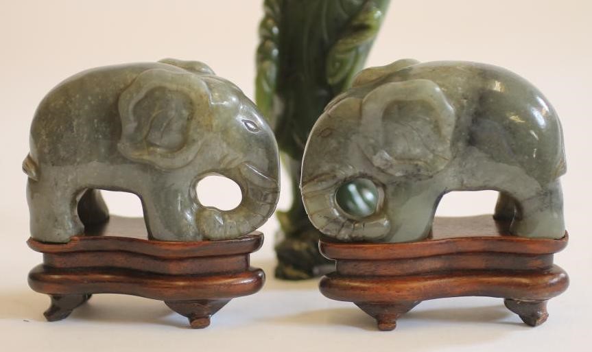 A PAIR OF CHINESE JADE TYPE MODELS OF ELEPHANTS Image