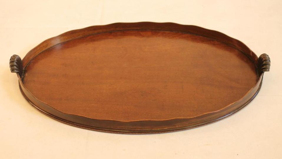 A GEORGIAN OVAL TEA TRAY Image