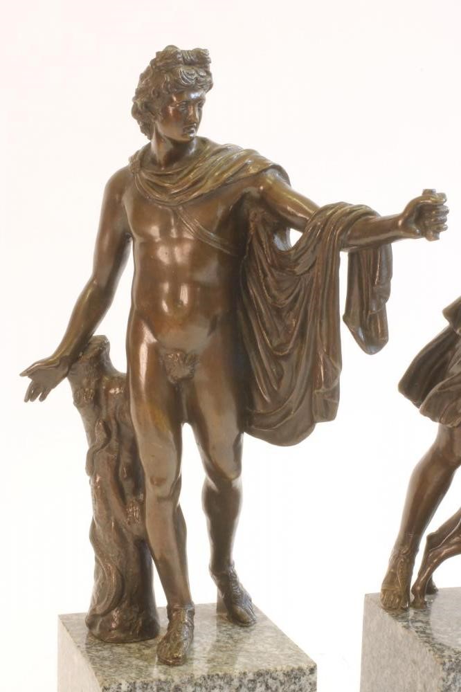A PAIR OF BRONZED METAL FIGURES OF DIANA AND THE APOLLO BELVEDERE Image