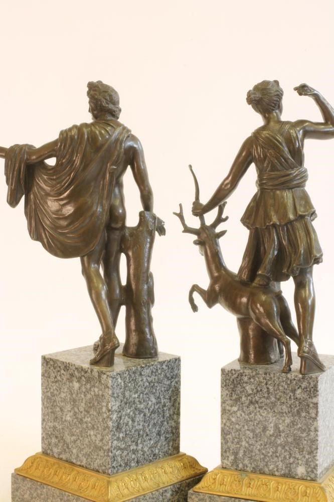 A PAIR OF BRONZED METAL FIGURES OF DIANA AND THE APOLLO BELVEDERE Image