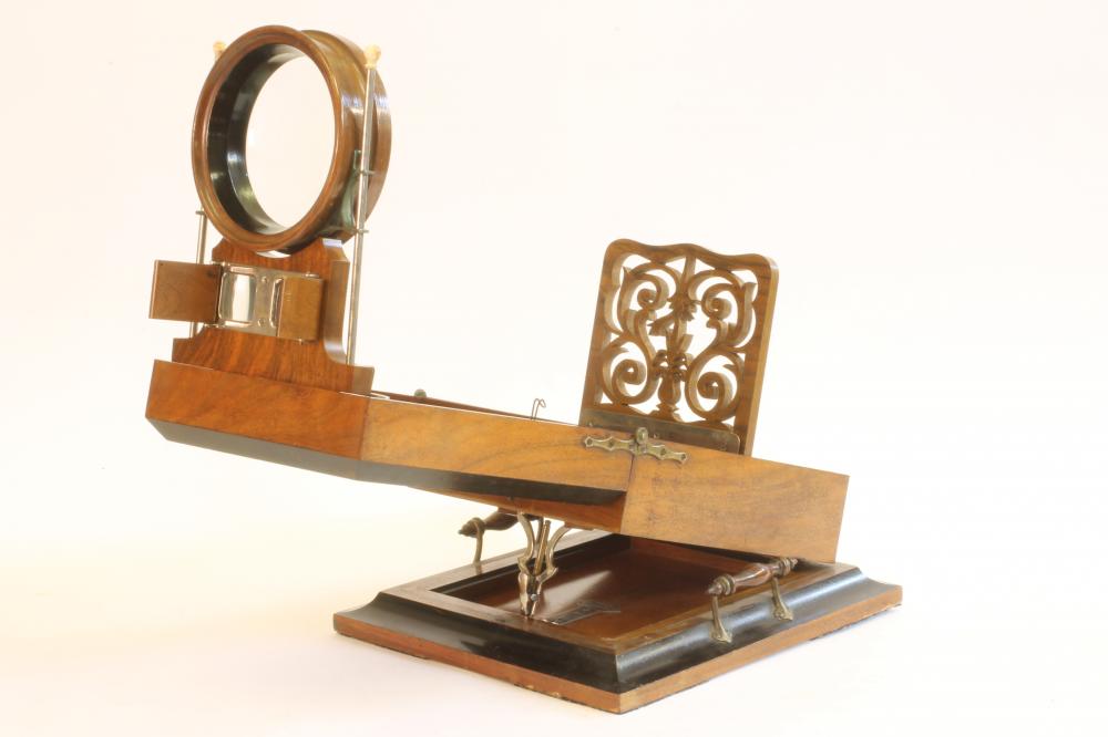 A WALNUT AND EBONISED CASED GRAPHOSCOPE Image