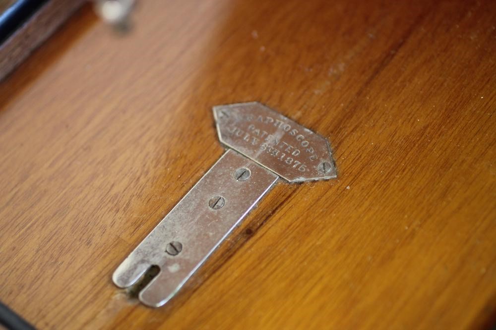 A WALNUT AND EBONISED CASED GRAPHOSCOPE Image