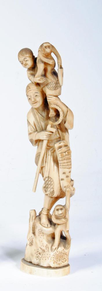 A JAPANESE CARVED IVORY ONE PIECE FIGURE Image