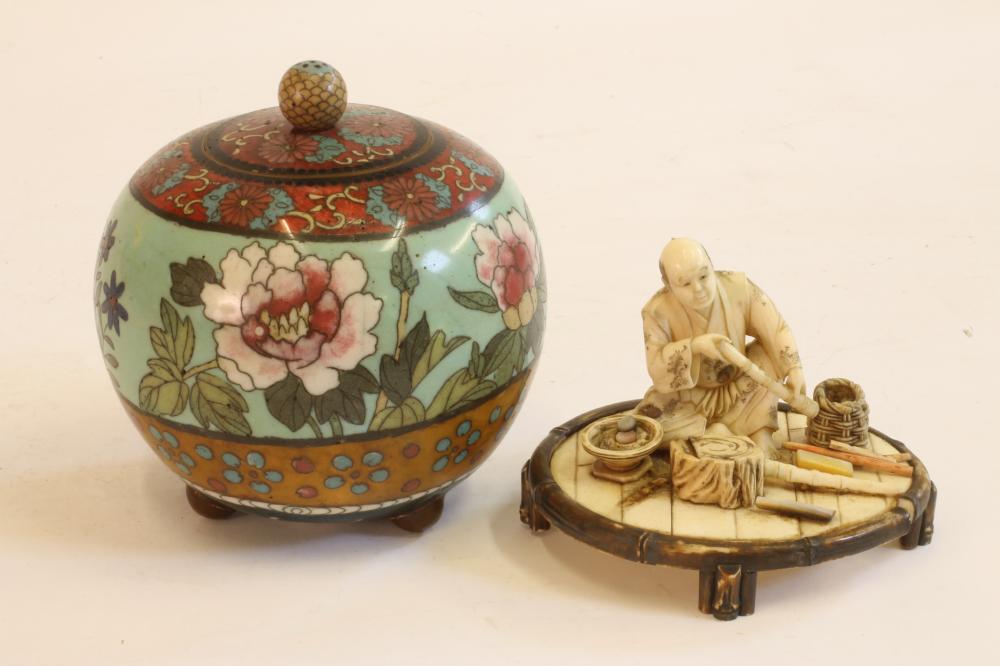 A JAPANESE IVORY FIGURE Image