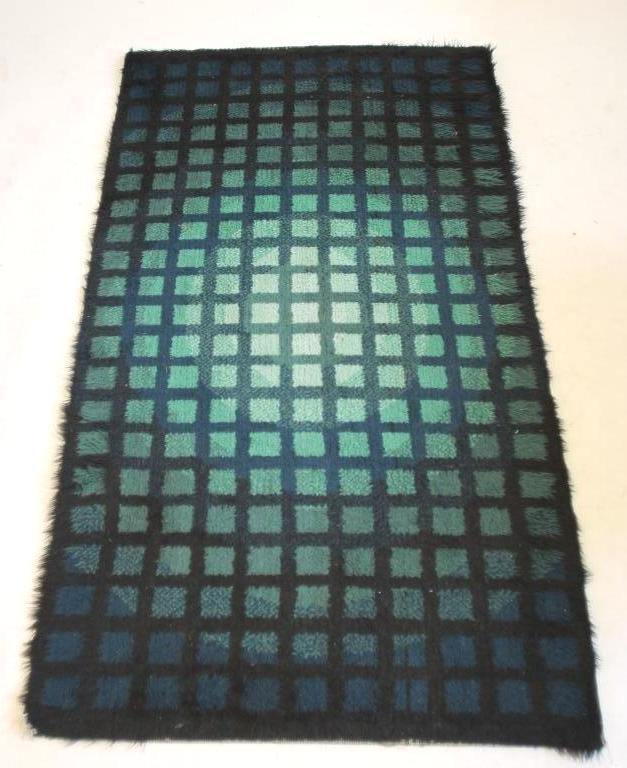 A WOOL HEARTH RUG Image