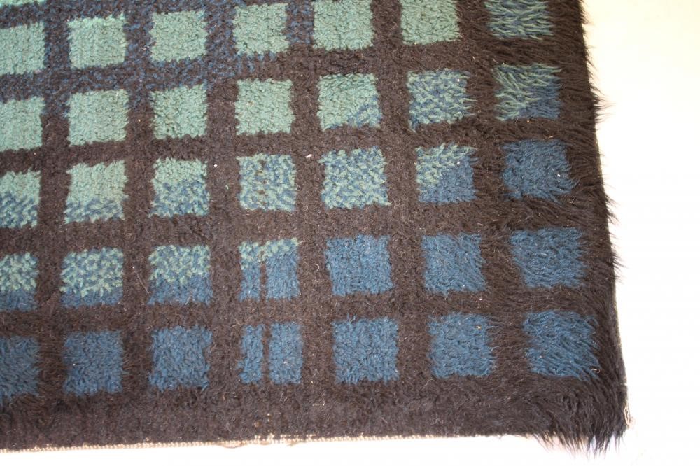 A WOOL HEARTH RUG Image