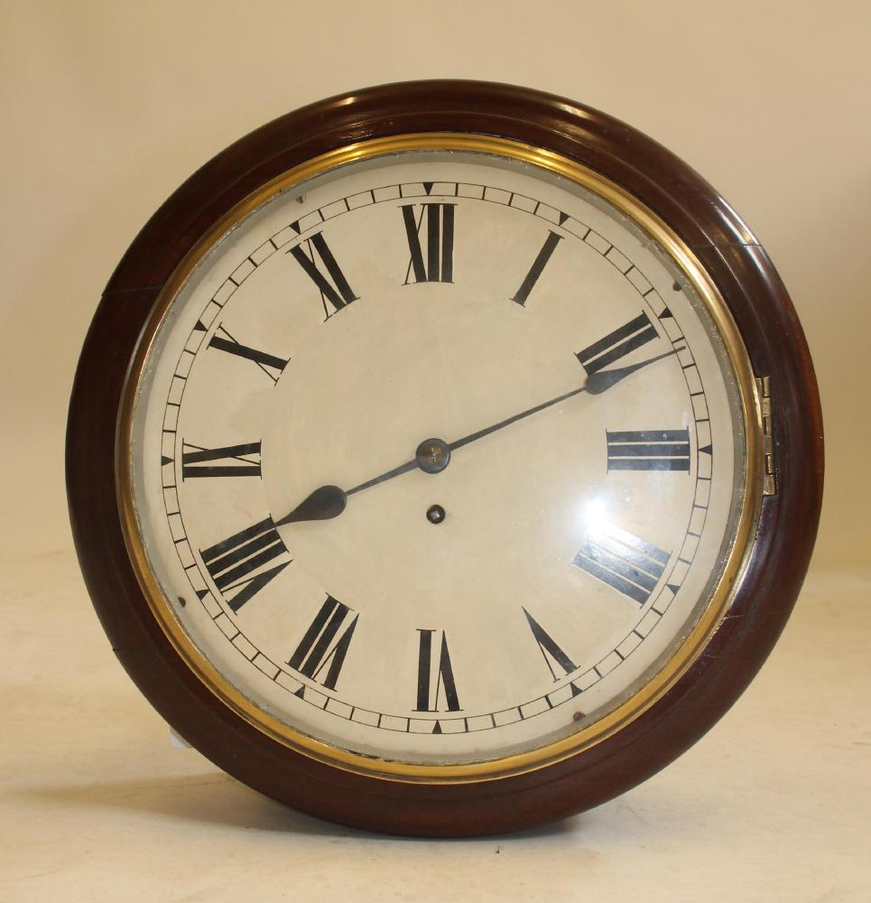 A MAHOGANY WALL CLOCK Image