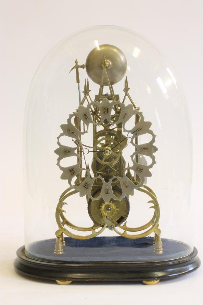 A BRASS SKELETON CLOCK Image
