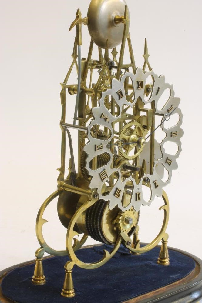 A BRASS SKELETON CLOCK Image