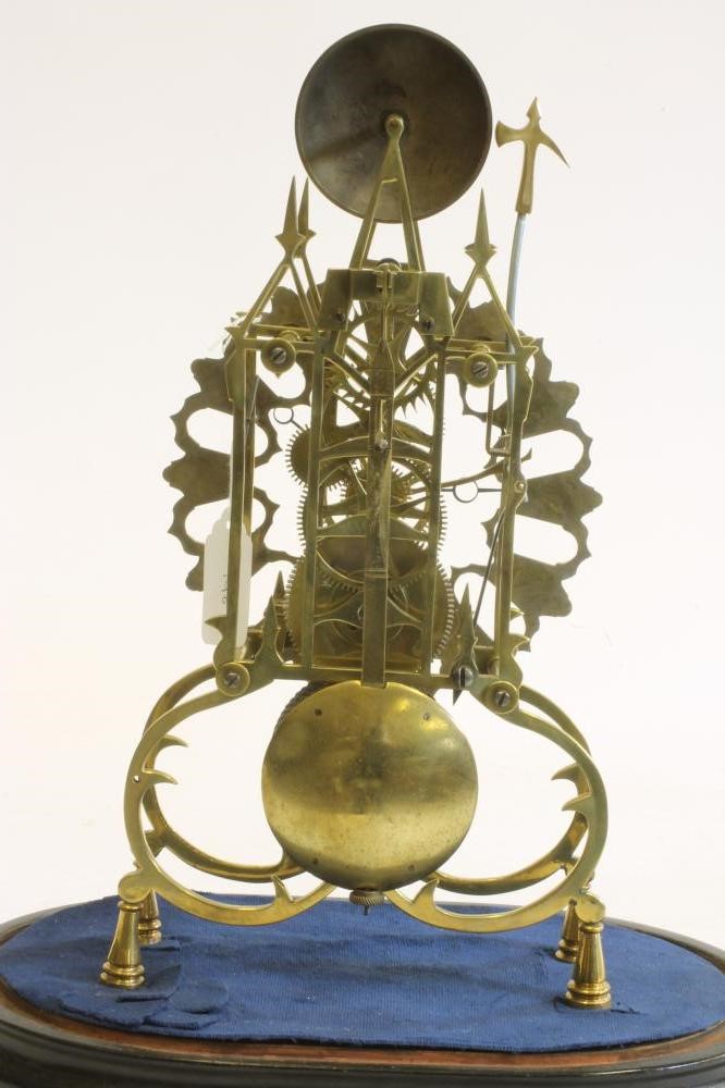A BRASS SKELETON CLOCK Image