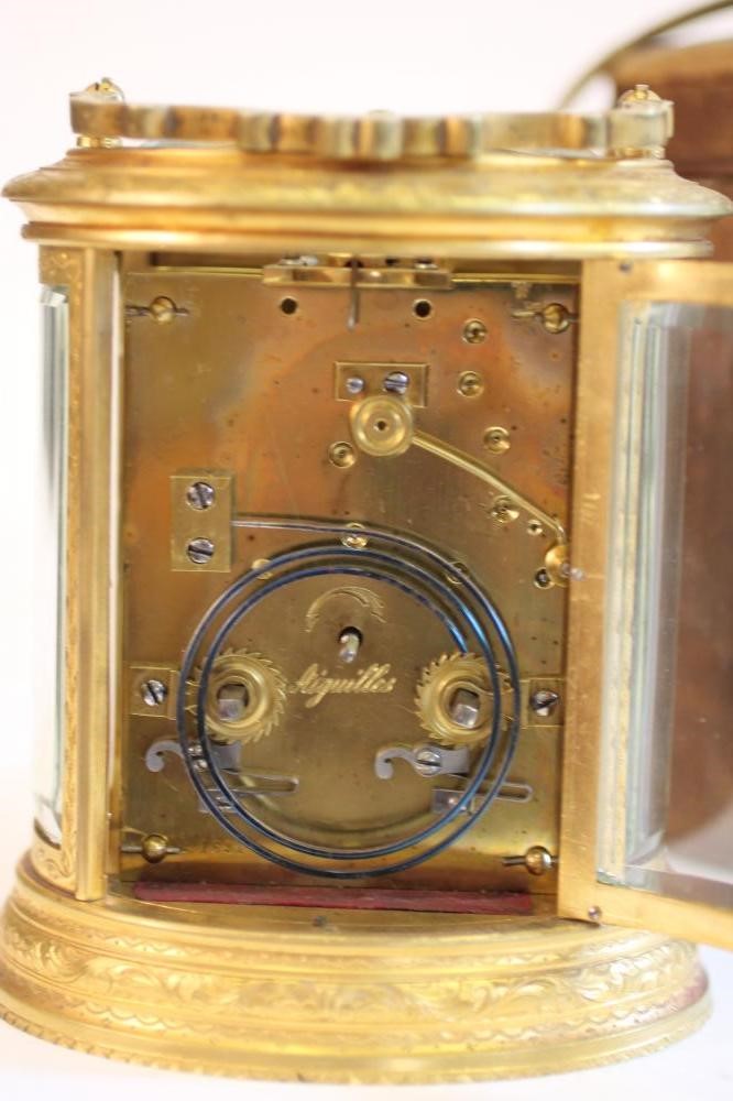A FRENCH BRASS STRIKING AND REPEATING CARRIAGE CLOCK Image